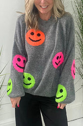 Lockerer Pullover mit Smiley-Gesicht, überschnittenen Schultern und Strick